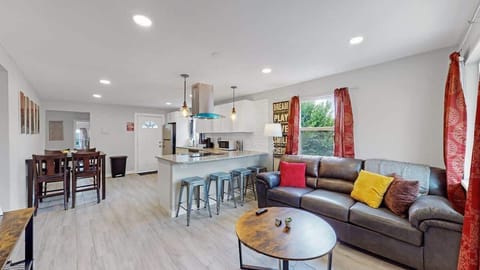 Stylish & Modern Living Room – Featuring a comfortable pull-out sofa, perfect for relaxing or accommodating extra guests.