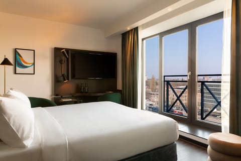 Deluxe Room, 1 King Bed, City View | In-room safe, desk, laptop workspace, blackout drapes