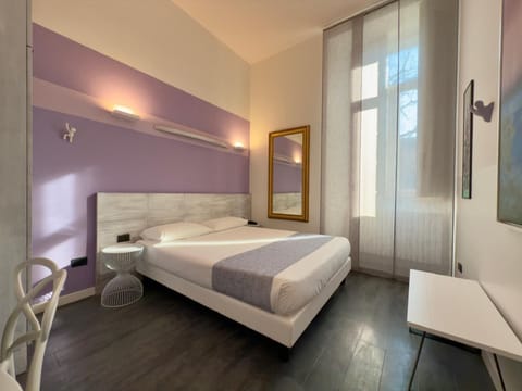 Standard Double or Twin Room | Minibar, in-room safe, desk, blackout drapes