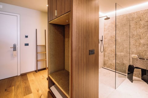 Junior Double Room | Living area | Flat-screen TV, foosball, table tennis, books