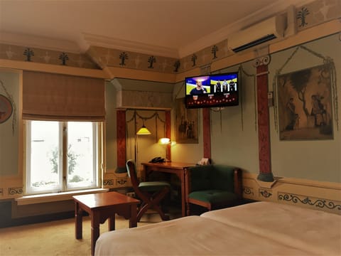 Romantic Quadruple Room, Multiple Beds, River View | In-room safe, desk, iron/ironing board, free WiFi