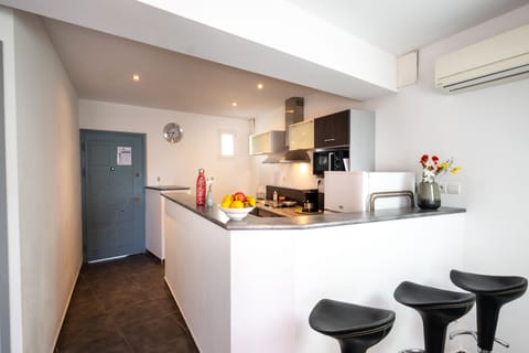 Apartment | Private kitchen | Full-size fridge, microwave, stovetop, espresso maker