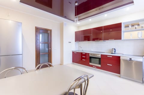 Comfort Apartment | Private kitchen | Full-size fridge, microwave, oven, stovetop