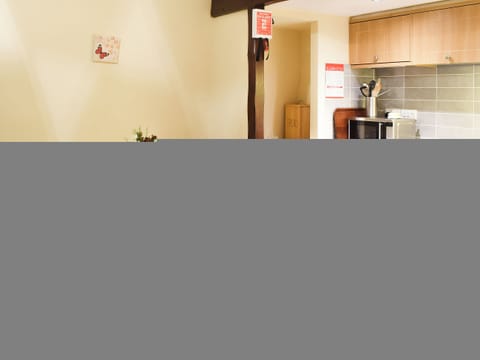 Modest dining area and adjacent kitchen | Willow Cottage - Round Hill Farm, Kirkstone near Ambleside