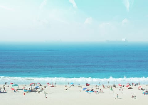 Beach nearby, beach umbrellas, beach towels, beach volleyball