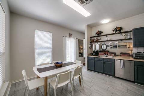 Fabulous dining table, and kitchen appliances