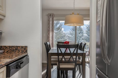 Dining Room with Easy Access to the Gas Grill on the Deck and Lake and Mountain Views