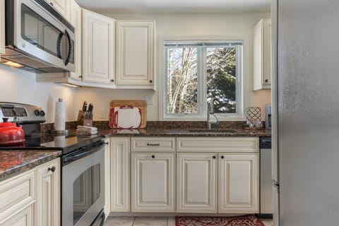 Kitchen is stocked with a Tea Kettle, Knife Block, Crock Pot, Blender, Toaster and Hand Mixer.