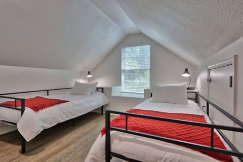 Upstairs game room with two twin beds