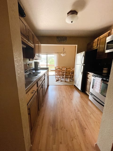 The kitchen is fully stocked for cooking. 