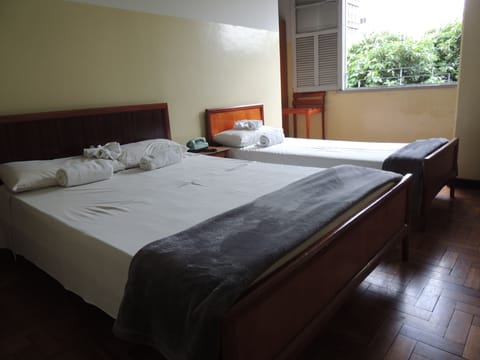 Triple Room, Multiple Beds | Minibar, in-room safe, desk, free WiFi