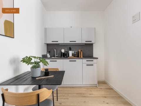 Deluxe Suite | Private kitchenette | Electric kettle