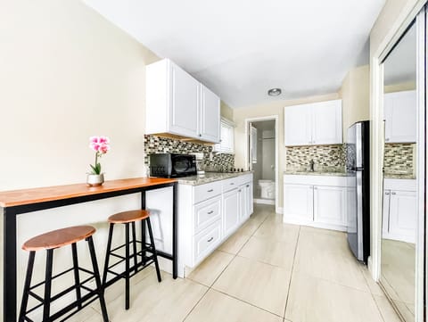 Studio | Private kitchen | Full-size fridge, microwave, oven, stovetop