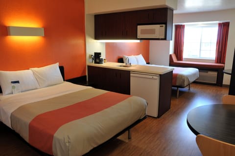 Deluxe Suite, 2 Queen Beds, Non Smoking, Refrigerator & Microwave | In-room safe, laptop workspace, blackout drapes, free WiFi