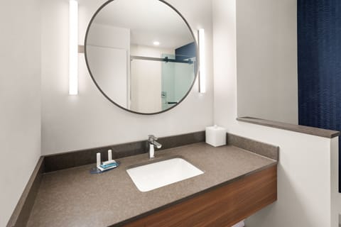 Desk, laptop workspace, blackout drapes, iron/ironing board