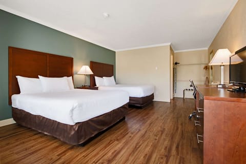 Standard Room, 2 Queen Beds, Non Smoking (Exterior Corridor) | Desk, free WiFi, bed sheets