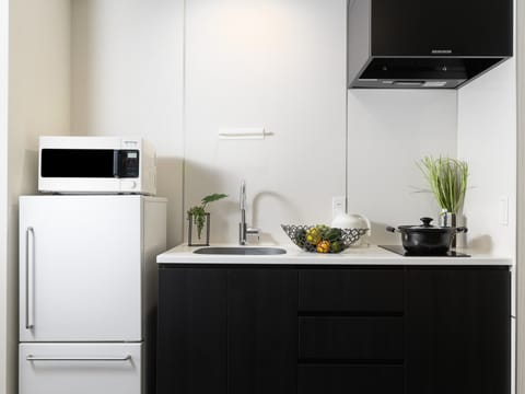 Full-size fridge, microwave, stovetop, griddle