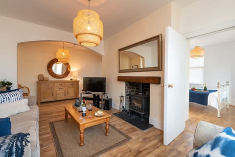 Bryn Awel Bach Living room with bedroom shot