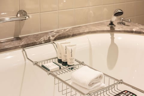 Grand Room, 1 King Bed (Premier) | Bathroom | Separate tub and shower, deep soaking tub, free toiletries, hair dryer