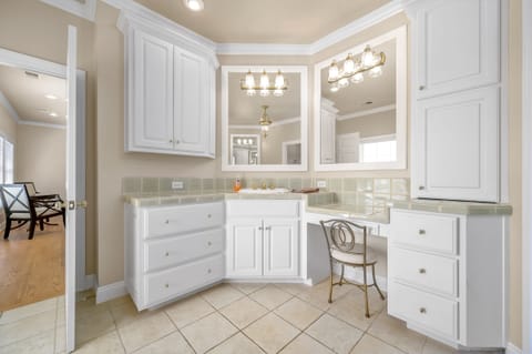 Master bath with separate vanity areas