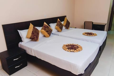 Executive Twin Room, 2 Bedrooms, Non Smoking, City View | Desk, laptop workspace, free WiFi, bed sheets