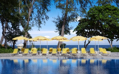 Outdoor pool, open 7:00 AM to 8:00 PM, free cabanas, pool umbrellas