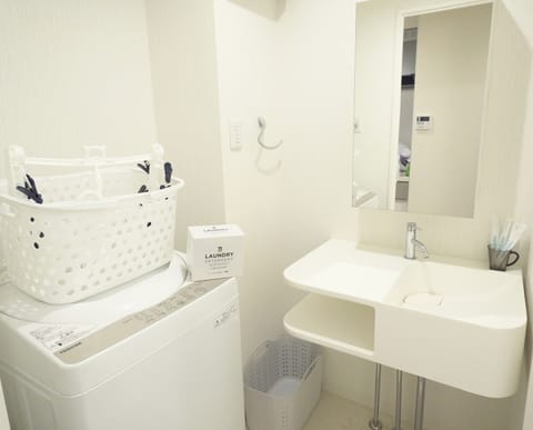 Business Apartment, Non Smoking | Bathroom | Separate tub and shower, free toiletries, hair dryer, slippers