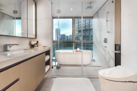 Premier Suite | Bathroom | Separate tub and shower, rainfall showerhead, hair dryer, bathrobes