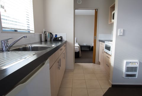 Family Suite, 1 Bedroom | Private kitchenette | Fridge, coffee/tea maker, electric kettle, toaster