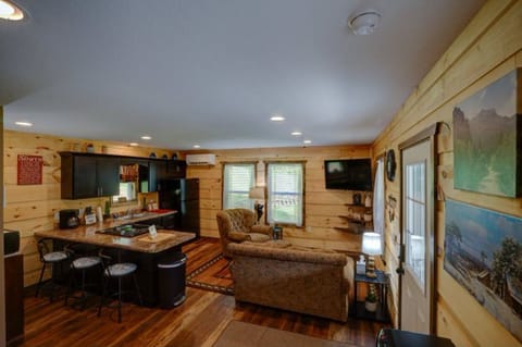 Signature Cabin, Mountain View | Living area | 50-inch TV with cable channels