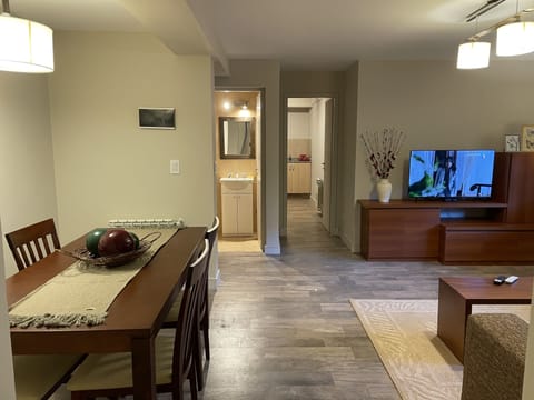 Apartment (#1) | Living area | 43-inch LED TV with satellite channels, TV