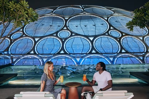 Outdoor pool, pool umbrellas, sun loungers