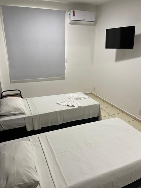 Economy Double or Twin Room | Minibar, free WiFi, bed sheets