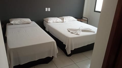 Economy Triple Room | Minibar, free WiFi, bed sheets