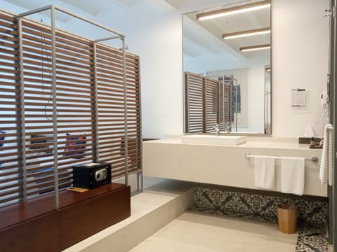 Deluxe Room, 2 Queen Beds | Bathroom | Shower, eco-friendly toiletries, hair dryer, bathrobes