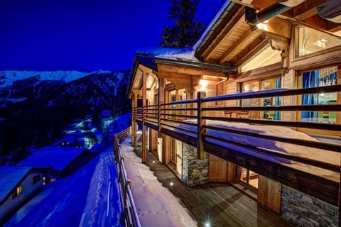 Chalet exterior at night