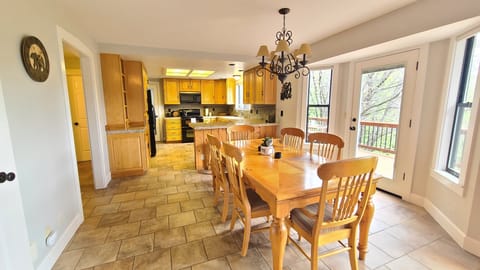 View of dining and kitchen from living room