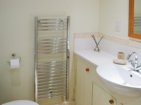 Bathroom with heated towel rail | Bluebell Cottage, Coniston