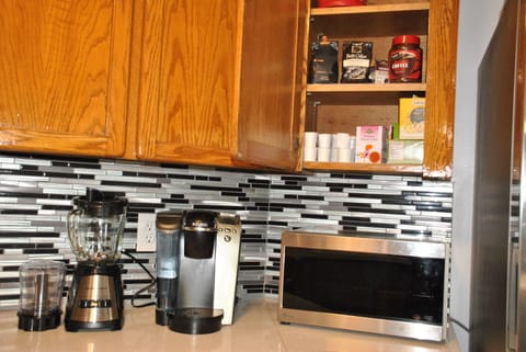 Plenty of coffees and teas in the cabinet.