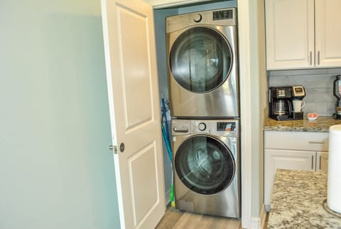 Full size washer and dryer. Starter pack of pods and dryer sheets provided.