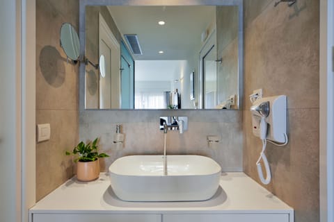 Free toiletries, hair dryer, bathrobes, slippers