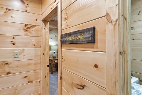 Upstairs room, king bed and walk in shower en suite bathroom.  Each room has deck access too!