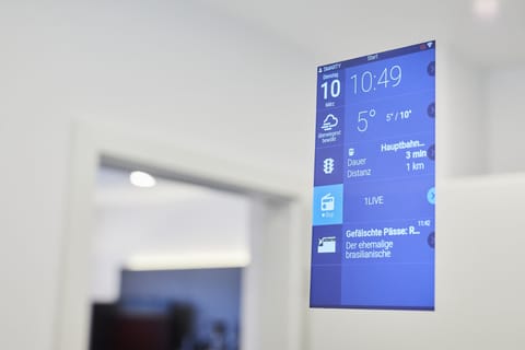 Signature Double Room | Living area | 32-inch flat-screen TV with cable channels, TV, tablet