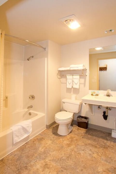 Queen Room with 2 Queen Beds and Fireplace | Bathroom | Shower, free toiletries, hair dryer, towels