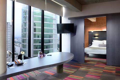 Junior Suite, 1 King Bed | In-room safe, desk, soundproofing, iron/ironing board