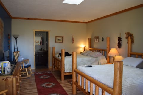 Standard Double Room, 2 Queen Beds | Living area | TV