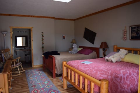 Standard Double Room, 2 Queen Beds | Living area | TV