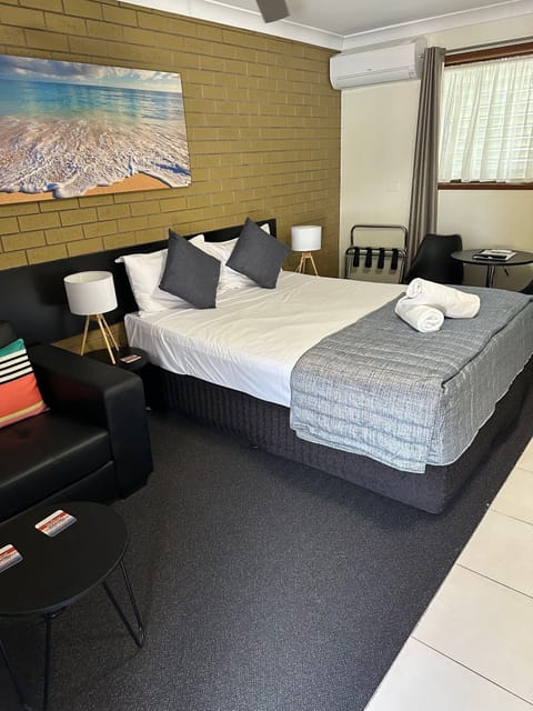 King Suite | Blackout drapes, iron/ironing board, cribs/infant beds, free WiFi