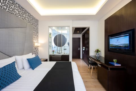 Boutique Room | Premium bedding, minibar, in-room safe, desk