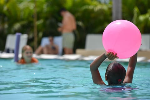 Outdoor pool, open 8:00 AM to 6:00 PM, free cabanas, pool umbrellas